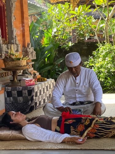 Purification, Palm Reading, and Trauma Healing within Balinese Tradition photo review